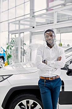 Africanamerican man came to see automobiles in dealership photo