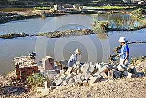 Africans working hard in brickyard