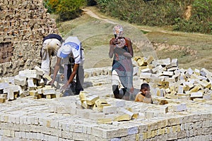 Africans working hard in brickyard