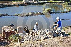 Africans working hard in brickyard