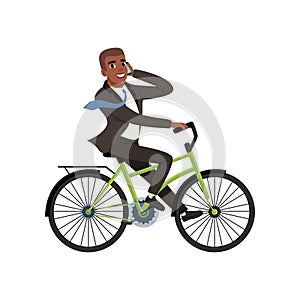 Afro-American businessman riding bicycle and talking on phone. Cartoon young guy in formal black suit with blue tie