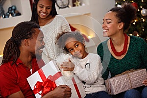 Afro-American child with family together for Christmas