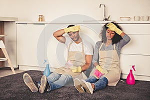 Afro American couple cleaning