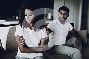 Afro American Couple On Couch. Quarrel Concept.