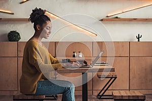 Afro American girl in cafe