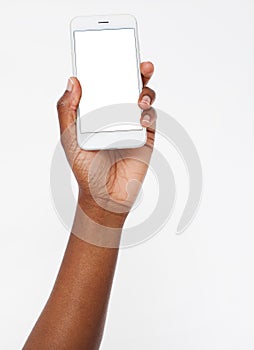 Afro american hand hold blank screen phone isolated on white background,mobile apps. Black arm. Top view.Mock up.Copy spacÃÂµ