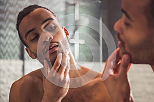 Afro American man in bathroom