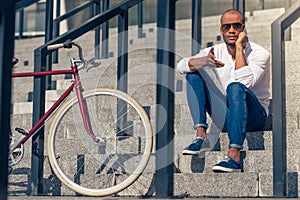 Afro American man with gadget