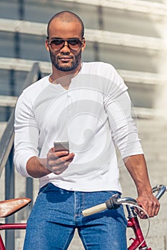 Afro American man with gadget