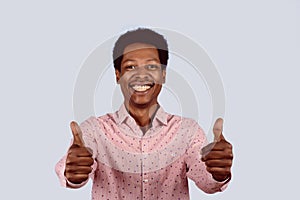 Afro American man showing thumbs up