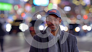 Afro-American Man in the streets of New York at Times Square - street photography