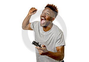 Afro american man using remote controller playing video game happy and excited