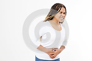 Afro american woman having painful stomachache on white background.Chronic gastritis. Abdomen bloating concept