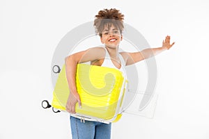 Afro american woman with yellow suitcase isolated on white template and blank background. Work and travel. Summertime african