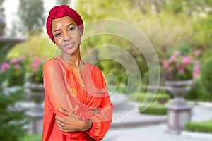 Afro beauty wearing a red headscarf