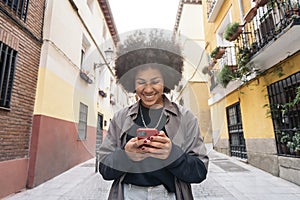 Afro Girl Using Phone