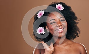Afro hair, mockup or portrait of black woman with flowers, beauty or smile on a brown studio background. Hairstyle