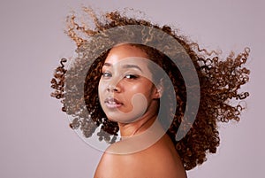 Afro, hair and portrait of black woman in studio with confidence, pride and salon. Natural haircare, curls and hairstyle