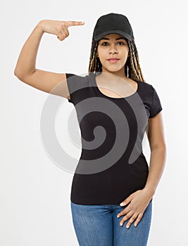 Afro woman in black template t shirt and baseball cap isolated on white background. Blank Sport hat and tshirt. African american