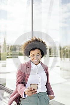 Afro Woman Using Phone