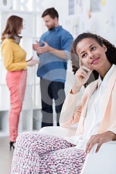 Afroamerican businesswoman resting in office