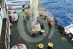 Aft mooring station situated on stern part of container ship behind superstructure.