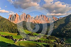 Afterglow over the Odle Ridge in the idyllic Dolomites mountains village St Madgalena