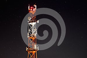 Against the background of the starry sky, the mobile communication towers of the 4g and 5g systems