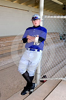 Against dugout Fence