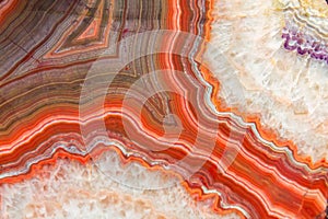 Agate mineral with red circles