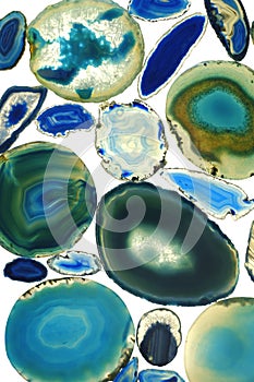 Agate Stone Pattern. Agates blue and green on white background.Agate slices background.Natural stones beautiful surface