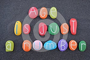 Age is just a number, motivational phrase with colored stone letters