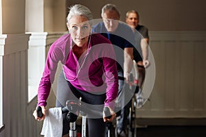 Age wont hold us back. a group of people having a spinning class at the gym.