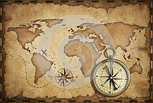 Aged brass antique nautical compass and old map photo