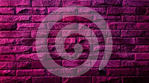 aged brick stone wall in neon violet color tone, close up view, used as background with blank space for design.