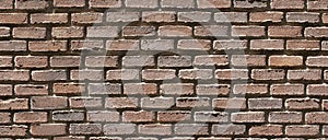 Aged brick wall texture. Seamless background pattern.