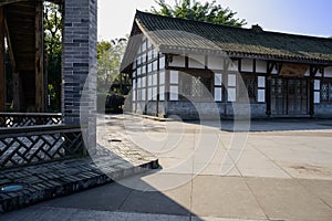 Aged Chinese timber framed house at sunny winter noon