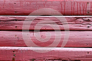 Aged cracked of red wooden timber wall texture