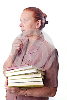 Aged female student with books