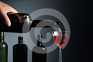 Aged golden fortified sherry being poured into a crystal glass