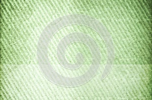 Aged green-toned corrugated wavy surface with copy space