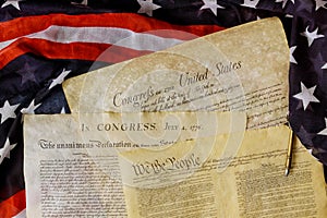 Aged historical documents Washington DC on American Declaration of independence 4th july 1776 on USA flag