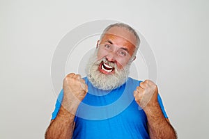 Aged man gesturing nervousness isolated on white