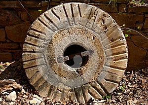 Aged old mill millwheel stone wheel in Spain