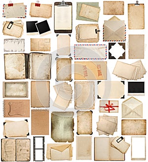 Aged paper, books, pages and old postcards isolated on white