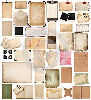 Aged paper sheets, books, pages and old postcards isolated on wh