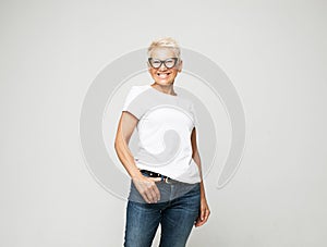 Aged people, lifestyle and maturity concept: blonde fifty year old European female