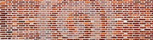 Aged Red Brick Wall texture background. Old stone panoramic background