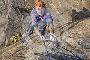 Aged rock climber