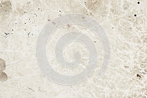 Aged rough weathered paper sheet, dirt stains, spots, inclusions cellulose, brown cardboard texture background, grunge
